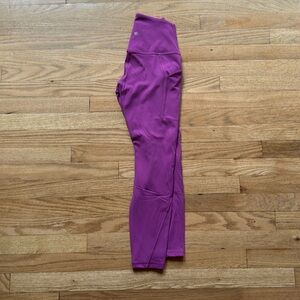 Lululemon Purple Leggings with side pockets - Size 4